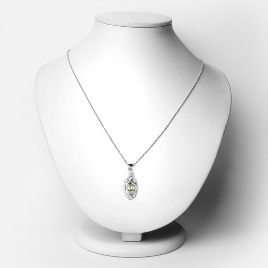 Colgante de plata de ley .925 con peridoto genuino de 0.55 quilates y topacio blanco