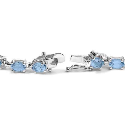Pulsera de Eslabones de Plata de Ley 925 con Topacio Azul Claro Creado en Forma Ovalada de 11.0 ct - 7 pulgadas
