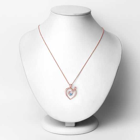 Colgante de plata de ley .925 con topacio azul suizo auténtico de 0,28 quilates