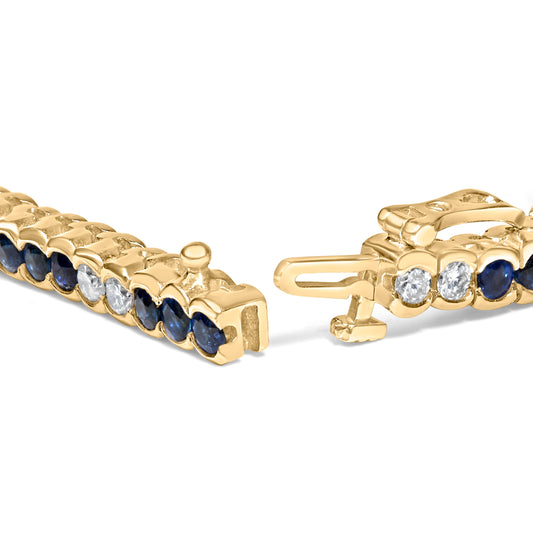 Pulsera de tenis de oro amarillo de 14 quilates con diamantes de 1 3/4 quilates en total y zafiros azules de 5.0 quilates en total engastados (color G-H, claridad SI1-SI2) - 17.78 cm
