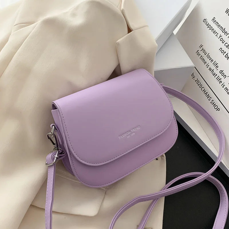 Trendy Saddle Shoulder Bag for Women | Sophisticated PU Leather Crossbody | Simple Solid Color Flap Messenger Bag | Fashion-Forward Designer Pouch for Versatile Daily Matching Luxegan