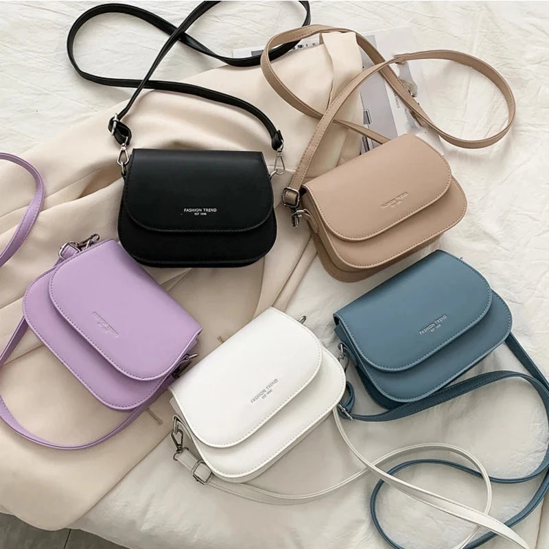 Trendy Saddle Shoulder Bag for Women | Sophisticated PU Leather Crossbody | Simple Solid Color Flap Messenger Bag | Fashion-Forward Designer Pouch for Versatile Daily Matching Luxegan