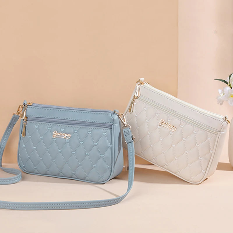 Women’s Embroidered Leather Handbag | Casual Satchel Messenger Bag | Ladies' Large Capacity Shoulder Bag with Decorative Hairball Pendant | Versatile PU Leather Top-Handle Bag Luxegan