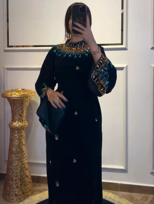 Luxury Black Velvet High-Neck Evening Dress | Exquisite Turquoise Floral Beaded Prom Gown | Full-Sleeve Floor-Length Velvet Wedding Party Dress with Self-Tie Waist Luxegan