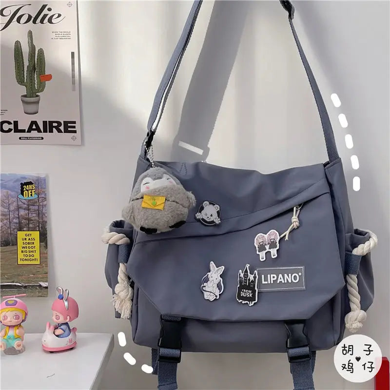 Unisex Harajuku Large Capacity Postman Bag | Japanese Style Canvas Student Messenger | Fashionable Crossbody Satchel with Applique Detail (Model b5) Luxegan