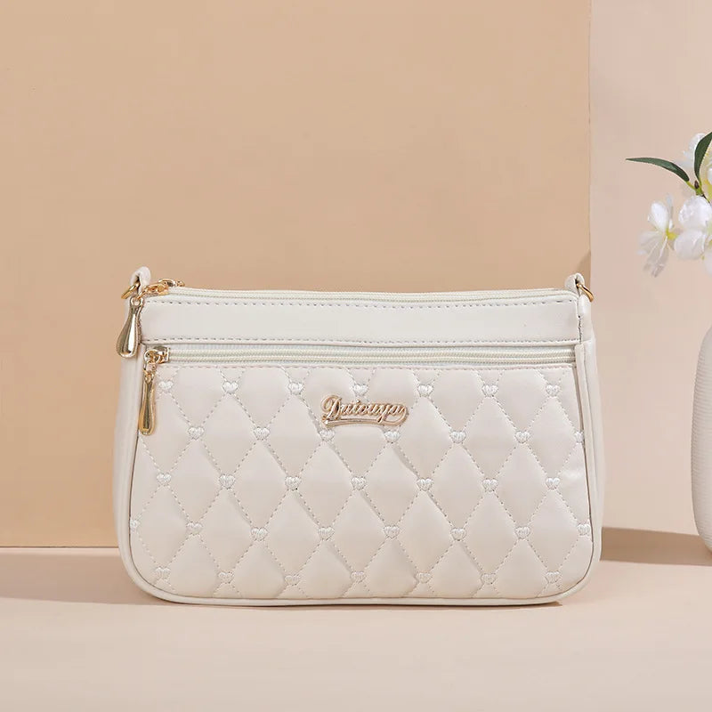 Women’s Embroidered Leather Handbag | Casual Satchel Messenger Bag | Ladies' Large Capacity Shoulder Bag with Decorative Hairball Pendant | Versatile PU Leather Top-Handle Bag Luxegan