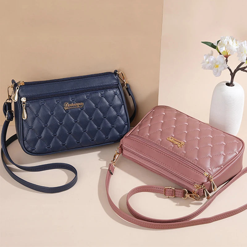 Women’s Embroidered Leather Handbag | Casual Satchel Messenger Bag | Ladies' Large Capacity Shoulder Bag with Decorative Hairball Pendant | Versatile PU Leather Top-Handle Bag Luxegan