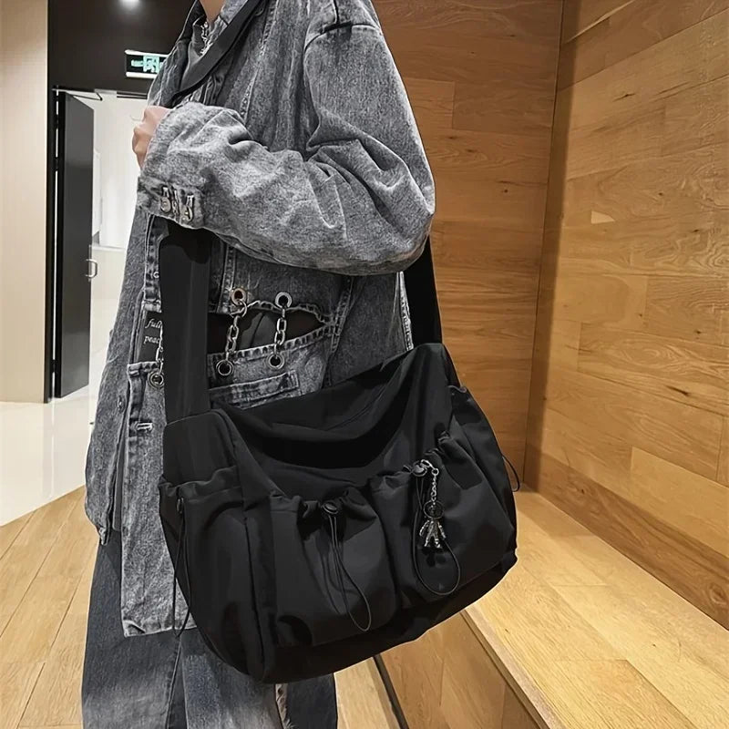 Fashionable Drawstring Crossbody Messenger Bag | Spacious & Secure Zippered Nylon Tote | Unisex Casual Shoulder Bag with Stylish Bag Charm Luxegan