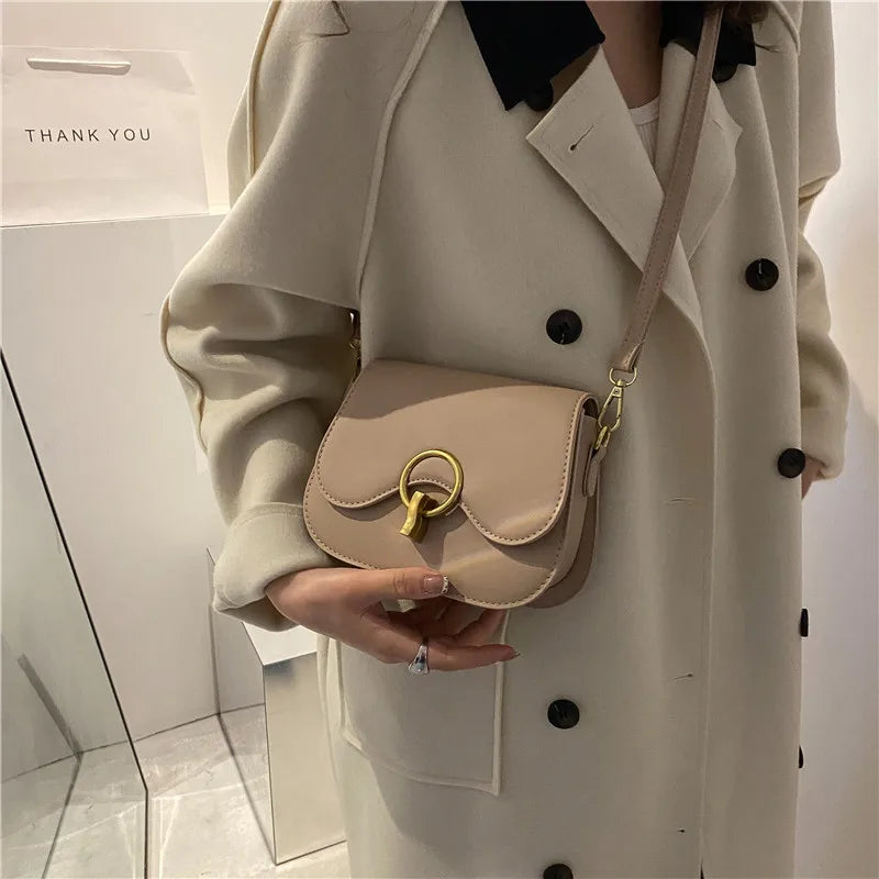 PU Leather Saddle Bag with Fashion Lock | Solid Color Flap Crossbody Purse Luxegan
