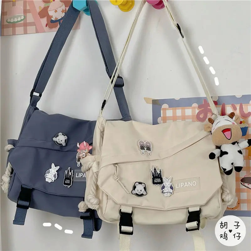 Unisex Harajuku Large Capacity Postman Bag | Japanese Style Canvas Student Messenger | Fashionable Crossbody Satchel with Applique Detail (Model b5) Luxegan