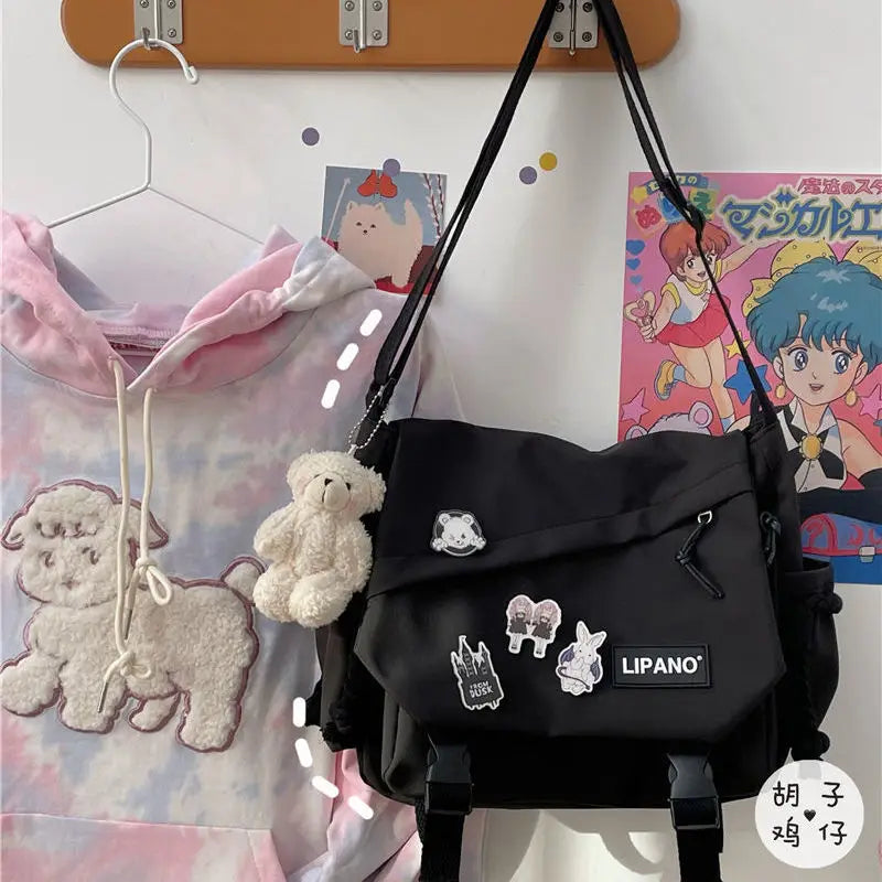 Unisex Harajuku Large Capacity Postman Bag | Japanese Style Canvas Student Messenger | Fashionable Crossbody Satchel with Applique Detail (Model b5) Luxegan