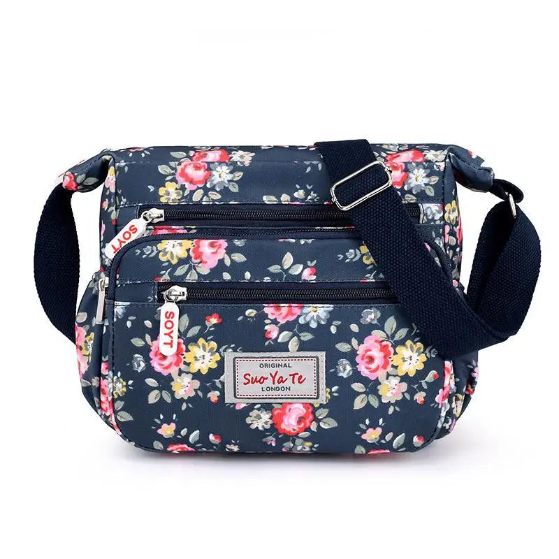 Women’s Floral Multi-Pocket Crossbody Handbag | Waterproof Canvas Shoulder Messenger Bag | Large Capacity Nylon Travel Bag for Hiking & Shopping | Durable Casual Floral Purse (Model 190417065127) Luxegan