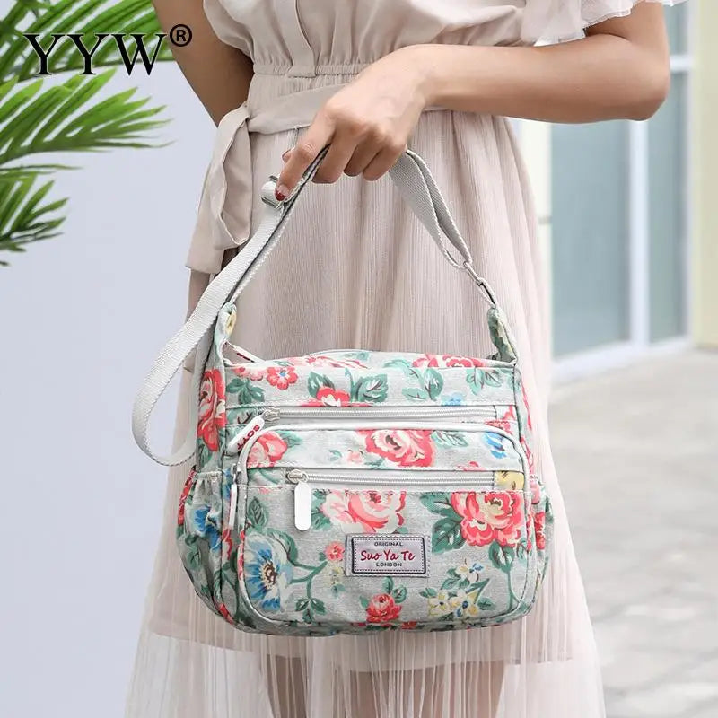 Women’s Floral Multi-Pocket Crossbody Handbag | Waterproof Canvas Shoulder Messenger Bag | Large Capacity Nylon Travel Bag for Hiking & Shopping | Durable Casual Floral Purse (Model 190417065127) Luxegan