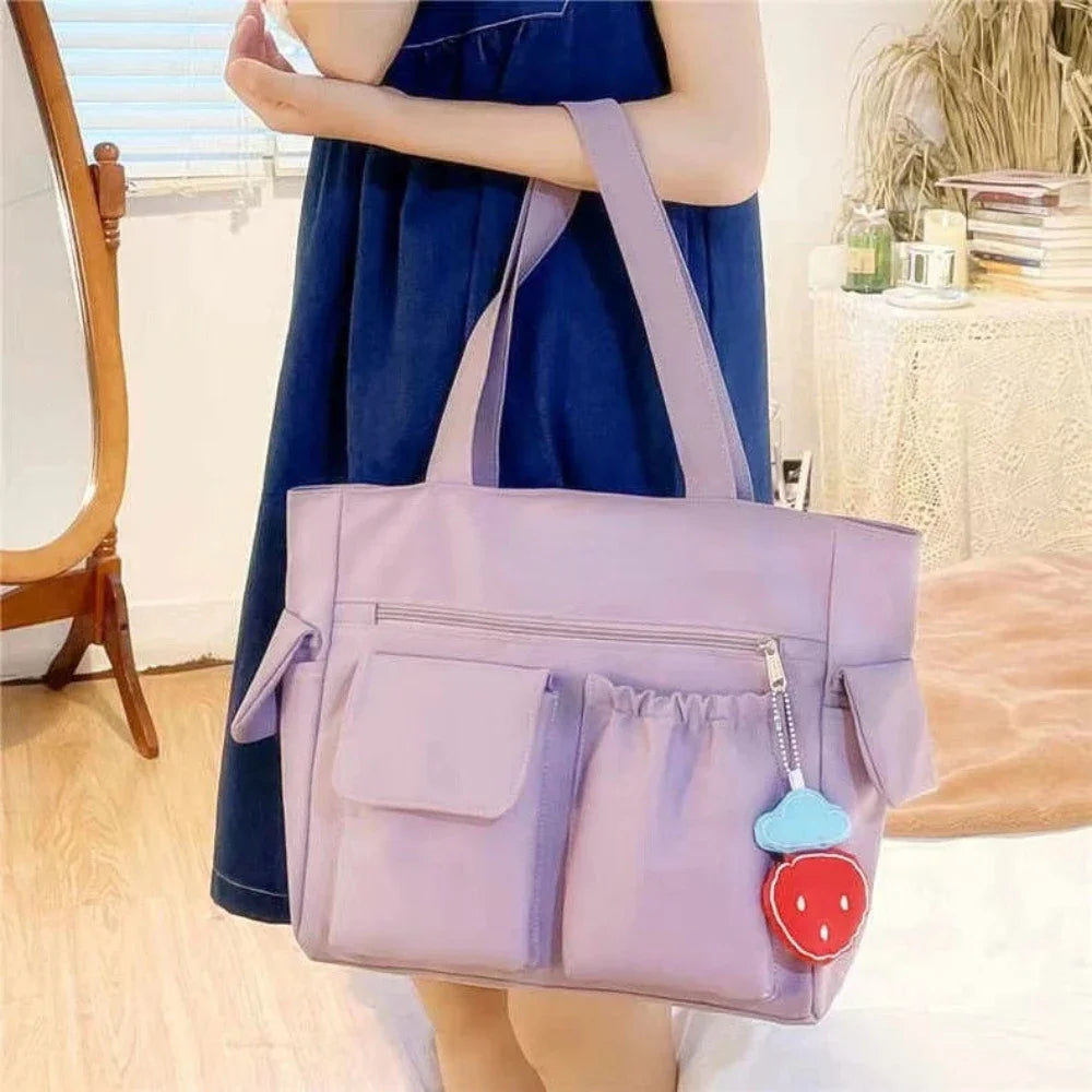 New Solid-Color Versatile Commuter Bag | Sophisticated Strawberry-Pendant Handbag | Elegant College-Style Large Capacity Shoulder Bag | "Dignified" Soft Oxford Tote for Multi-Season Styling Luxegan