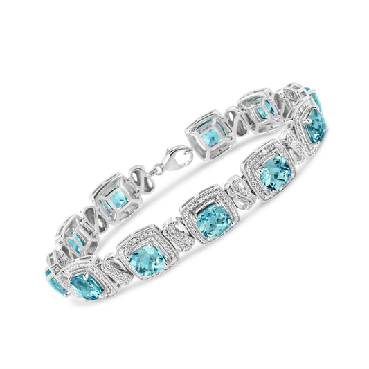 Pulsera de tenis de plata de ley .925 con topacio azul talla cojín de 7x7 mm y diamante de talla sencilla de 1/10 Ctw en forma cuadrada (color I-J, claridad I1-I2) - 7"