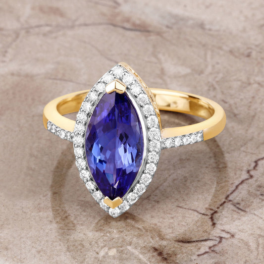 Anillo de oro amarillo de 14K con tanzanita genuina de 2.33 quilates y diamantes blancos