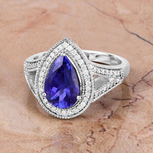 Anillo de tanzanita auténtica de 2.60 quilates y diamantes blancos en oro blanco de 14K