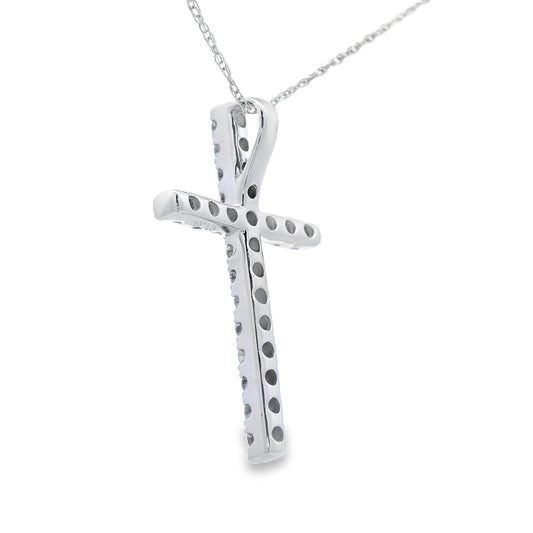 Colgante de cruz religiosa con diamante de .33 ct en oro blanco de 14 kt