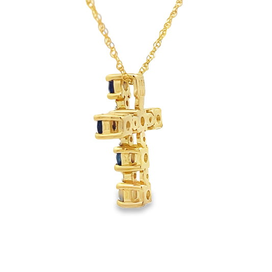Colgante religioso de cruz con zafiros de .32ct en oro amarillo de 10K