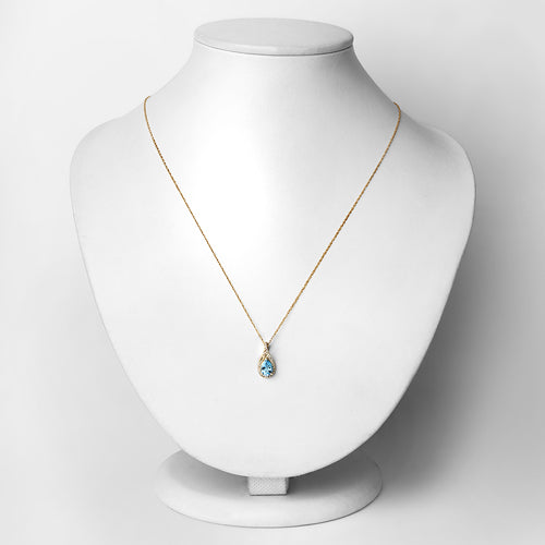 Colgante de topacio azul suizo auténtico de 0,89 quilates y diamante blanco en oro amarillo de 14 quilates