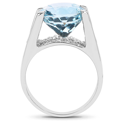 Anillo de plata de ley .925 con topacio azul auténtico de 7.21 quilates y circonitas cúbicas blancas