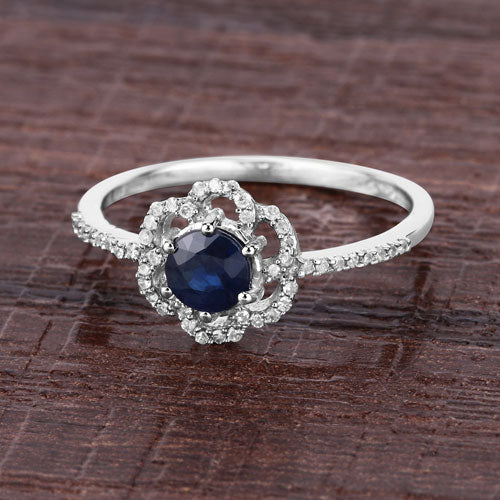 Anillo de oro blanco de 14K con zafiro azul auténtico de 0,78 quilates y diamante blanco