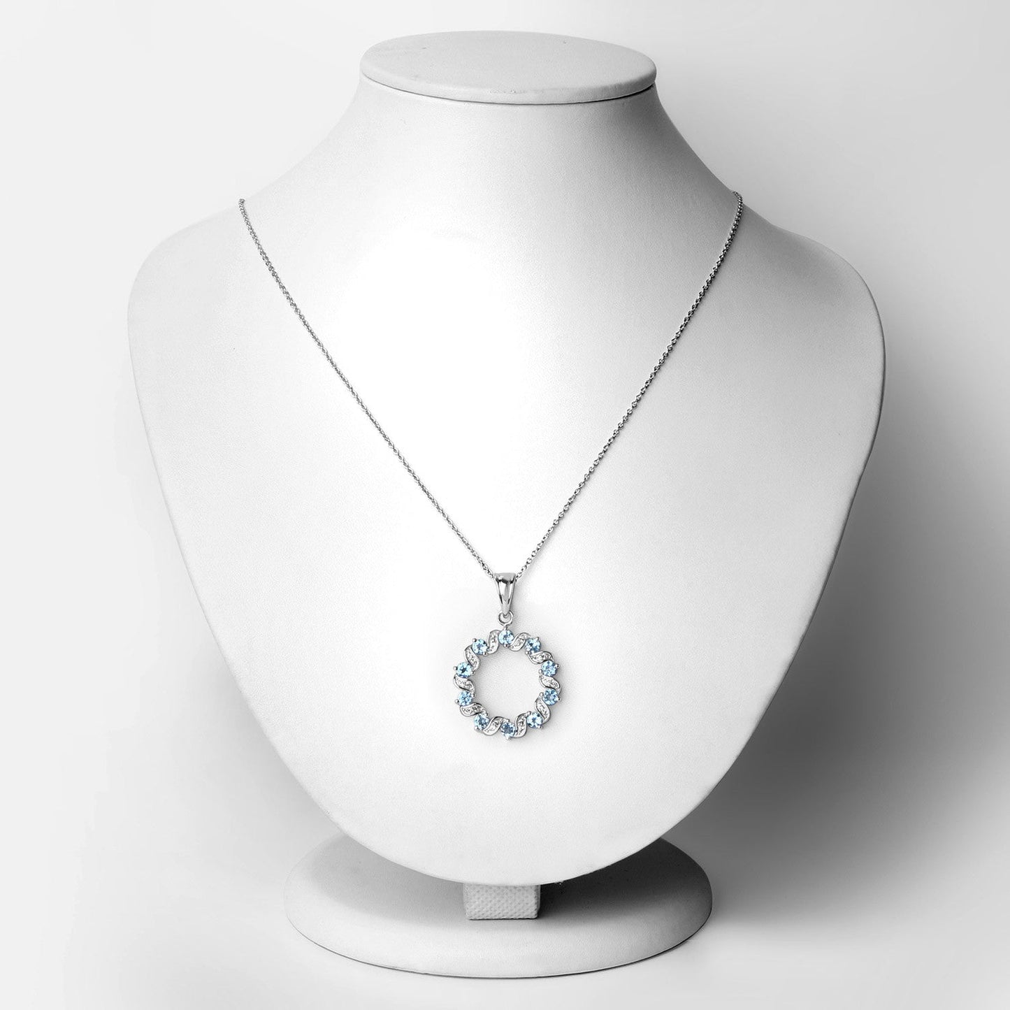 Colgante de plata de ley .925 con topacio azul suizo auténtico y topacio blanco de 1,30 quilates