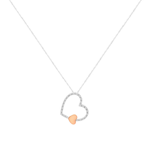 Collar con colgante de corazón flotante de oro bicolor de 10 qt y diamantes de 1/6 ct. (K-L, I1-I2)