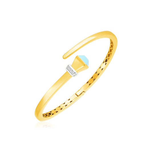 Brazalete rígido articulado de oro amarillo de 14k estilo cruzado con turquesa y diamantes