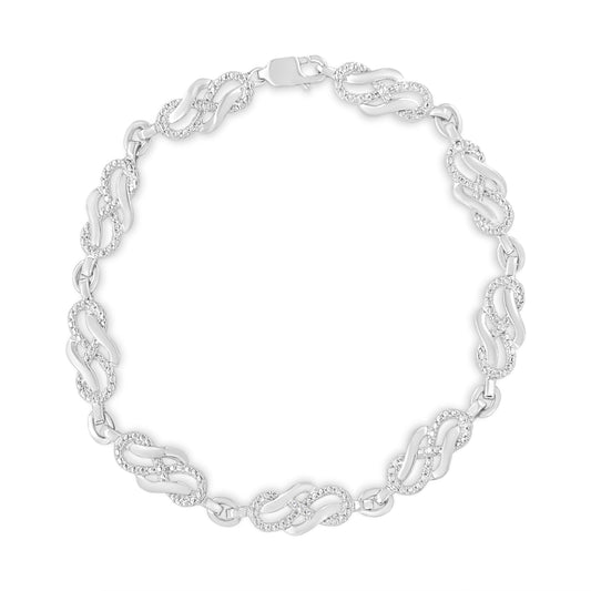 Pulsera de eslabones de tejido infinito con acentos de diamantes engastados en garras de plata de ley .925 de 7.25" (color I-J, claridad I3)