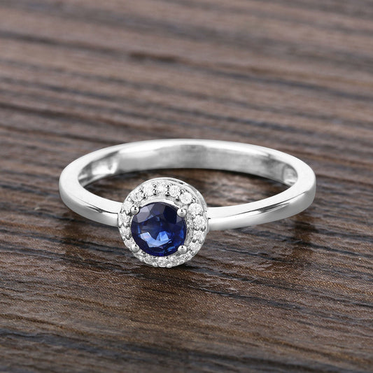 Anillo de oro blanco de 14K con zafiro azul genuino de 0,52 quilates y diamantes blancos