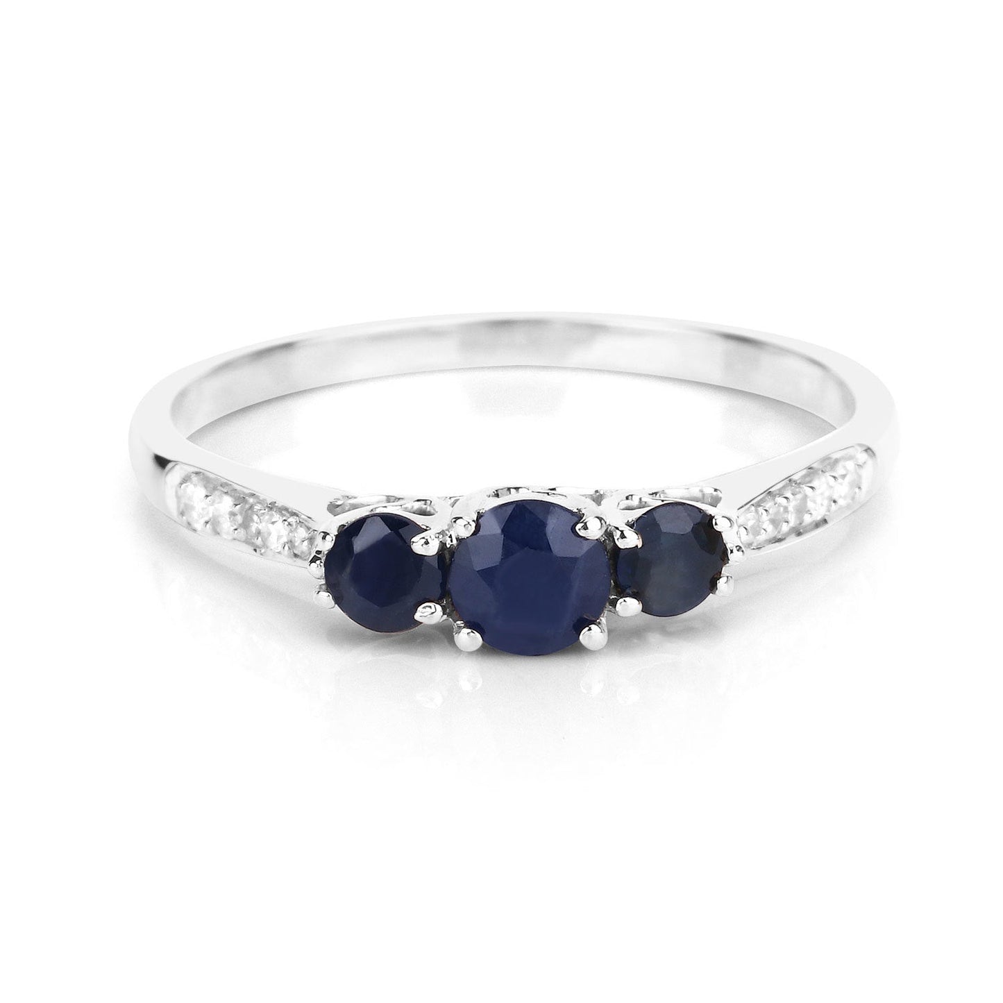Anillo de oro blanco de 14K con zafiro azul genuino de 0,56 quilates y diamantes blancos
