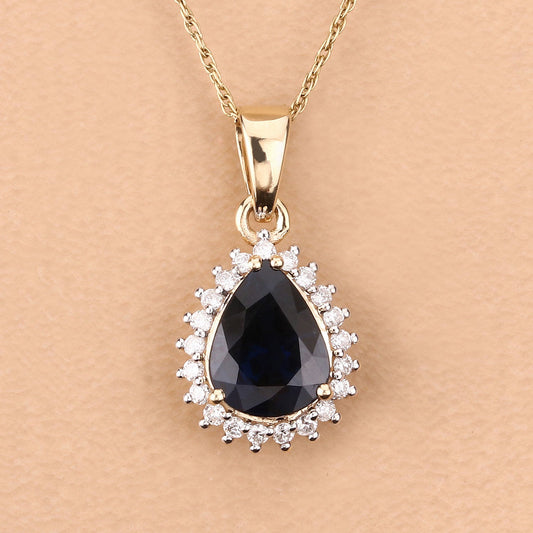 Colgante de oro amarillo de 14 quilates con zafiro azul genuino de 2,09 quilates y diamantes blancos