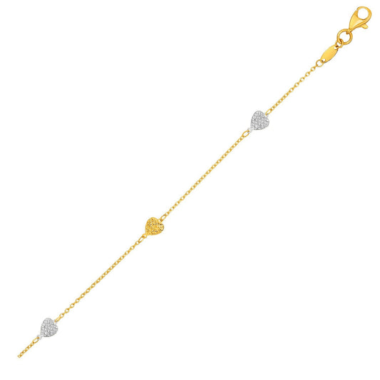 Tobillera de oro bicolor amarillo y blanco de 14k con corazones texturizados