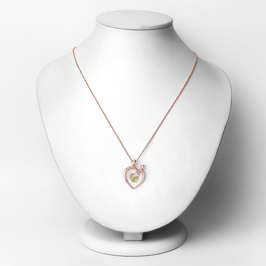 Colgante de plata de ley .925 con peridoto genuino de 0,25 quilates