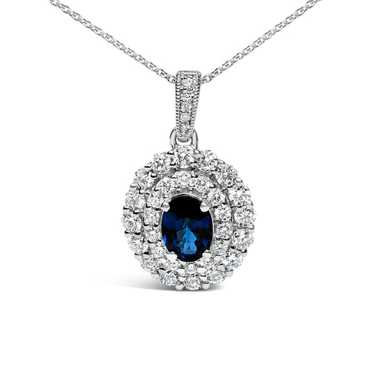 Collar con colgante de halo de zafiro azul ovalado y diamantes de 3/4 Cttw en oro blanco de 14K