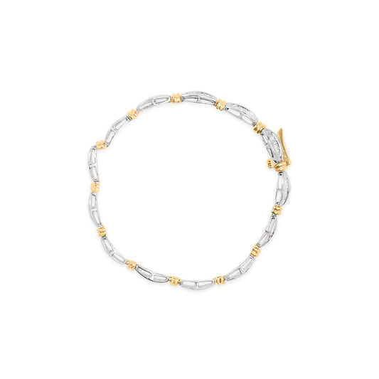 Brazalete de eslabones de canal con diamantes baguette de 2,0 quilates de oro bicolor de 10K