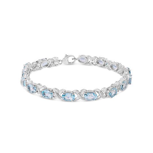 Pulsera de eslabones X tipo tenis de plata de ley .925 con topacio azul ovalado y acentos de diamantes de 16.0 Cttw (color I-J, claridad I1-I2) - Tamaño 7 pulgadas