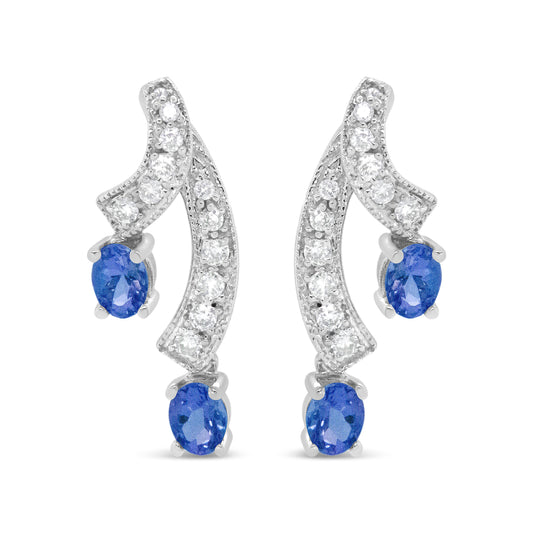 Pendientes de gota de oro blanco de 14 quilates con tanzanita azul natural ovalada de 4x3MM y diamantes de 1/5 Cttw con doble caída de 3/4" (Color H-I, Claridad VS1-VS2)