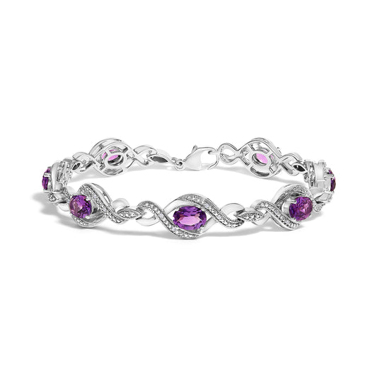 Pulsera de tenis con cruz de amatista ovalada de 7x5 mm y diamante natural redondo de 1/10 Cttw de plata de ley .925 (color I-J, claridad I1-I2) - 7"