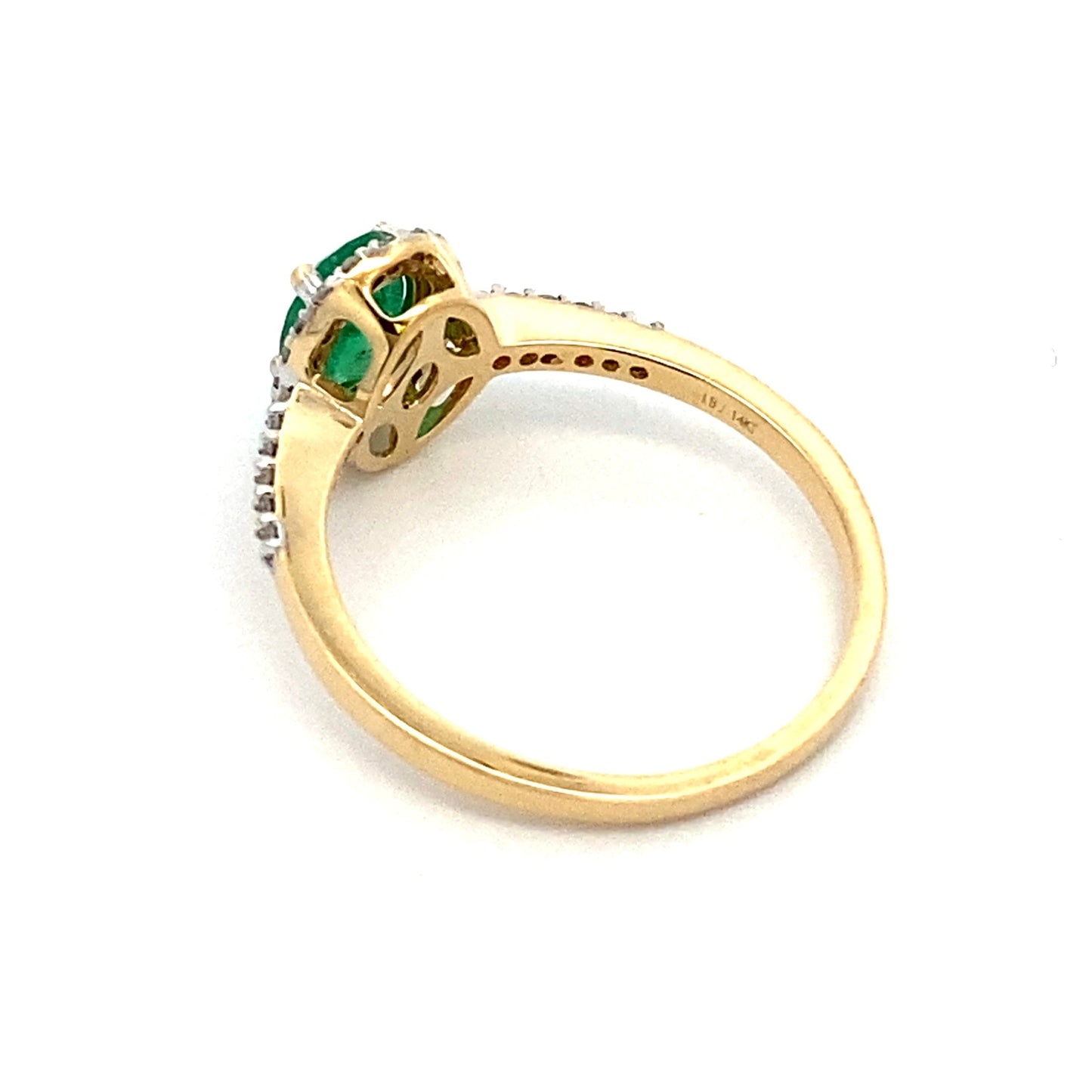 Anillo de diamantes talla esmeralda de .74ct en oro amarillo de 14K