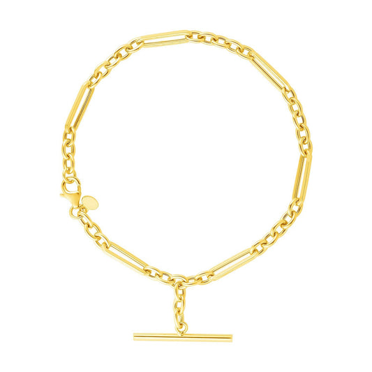 Pulsera de cadena con alternancia de óvalos y redondos de oro amarillo de 14k y 7 1/5 pulgadas con cierre de palanca