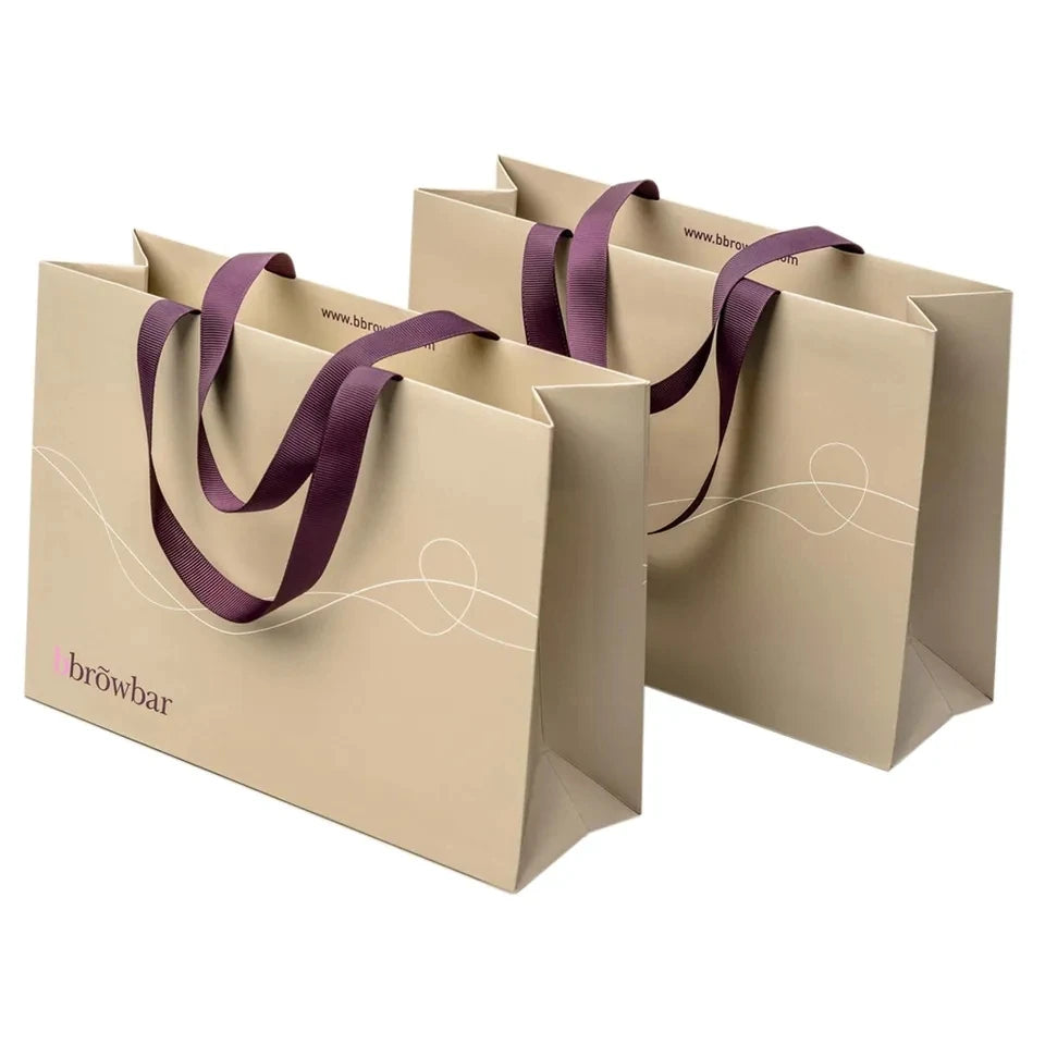 500pcs Wholesale Custom Logo Design Paper Bags | Luxury Ribbon Handle Gift Packaging for Cosmetics & Jewelry | High-Quality 250g Paperboard Shopping Bags Luxegan