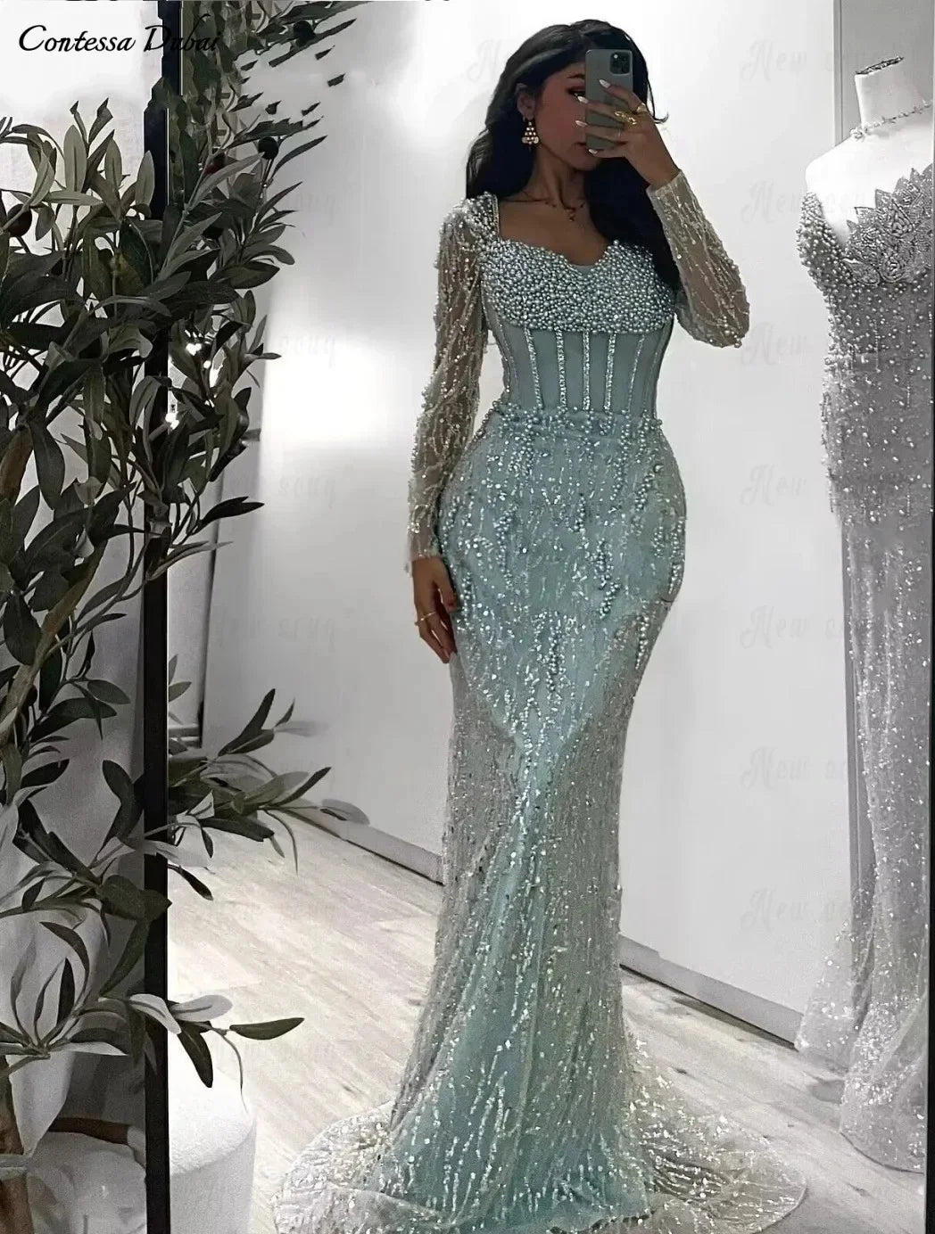 Luxury Mint Green Mermaid Evening Gown | Dubai Heavy Beaded Pearls Formal Party Dress | Exquisite Long Sleeve Illusion Corset Prom Gown | Sequin Satin Ankle-Length Trumpet Dress Luxegan