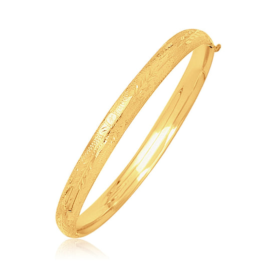 Brazalete infantil de oro amarillo de 14k con motivo de cúpula y cortes de diamante