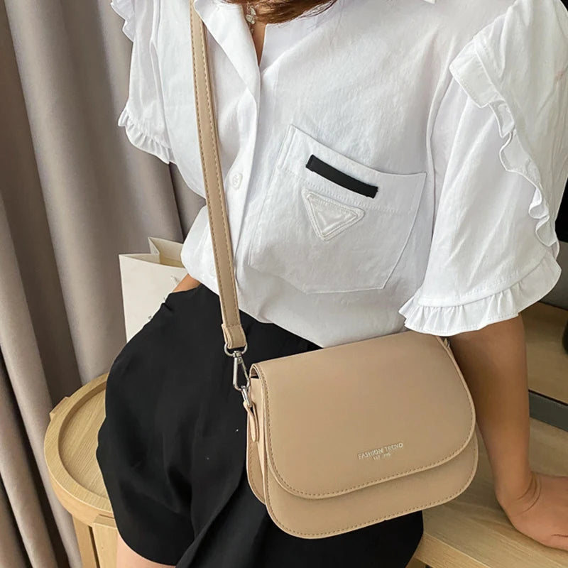 Trendy Saddle Shoulder Bag for Women | Sophisticated PU Leather Crossbody | Simple Solid Color Flap Messenger Bag | Fashion-Forward Designer Pouch for Versatile Daily Matching Luxegan