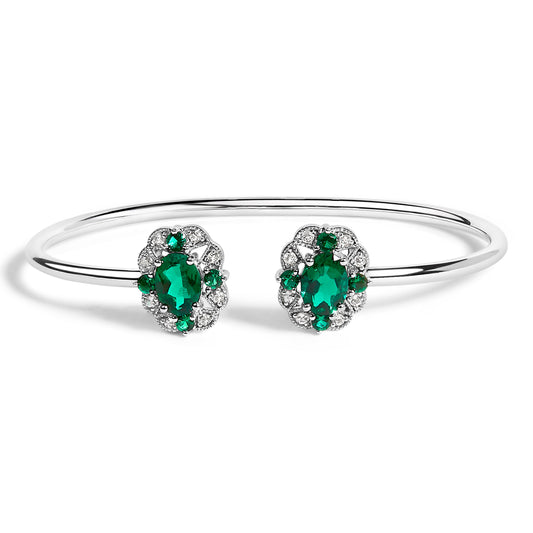 Brazalete de plata esterlina con topacio blanco y esmeralda verde con diseño floral