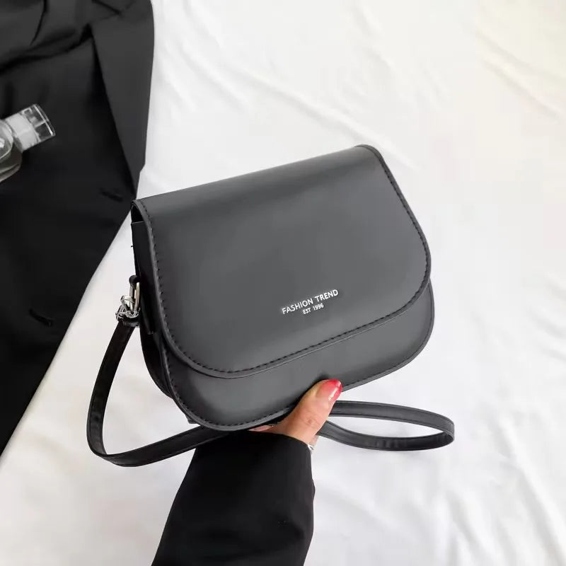 PU Leather Saddle Bag with Fashion Lock | Solid Color Flap Crossbody Purse Luxegan