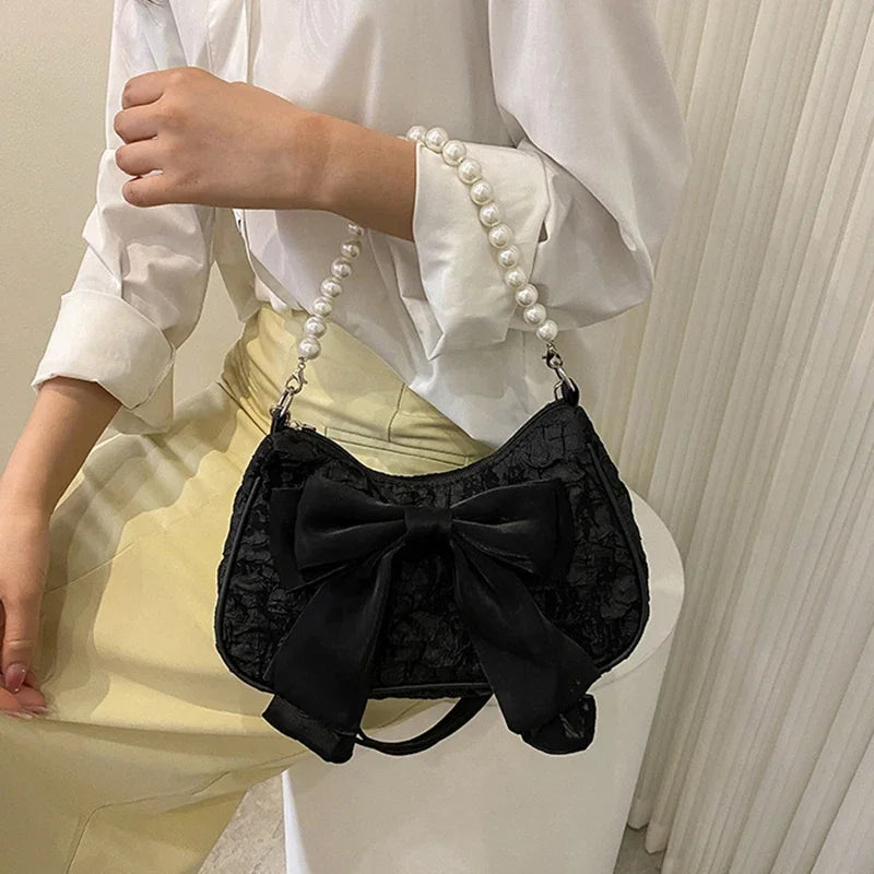 White Folds Pop Retro Bow Bag | Female Pearl Handle New Fashion Pearl Armpit Shoulder & Crossbody Bag Luxegan