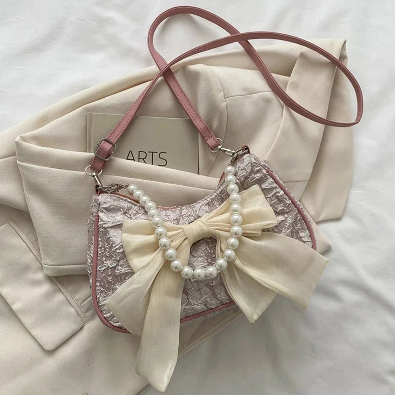 White Folds Pop Retro Bow Bag | Female Pearl Handle New Fashion Pearl Armpit Shoulder & Crossbody Bag Luxegan